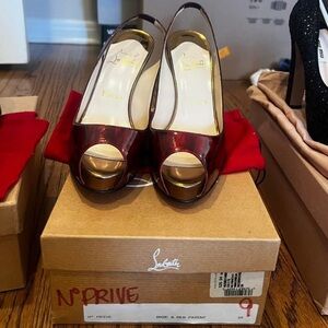 New with original box Christian Louboutin bronze patent pumps
